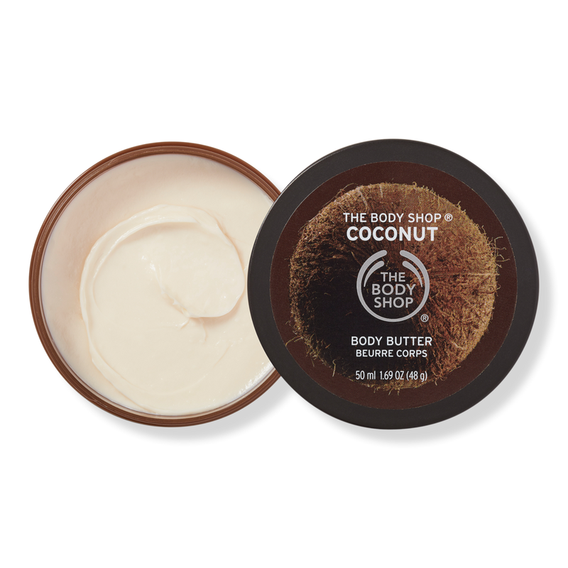 The body shop body butter. Боди шоп баттер Кокос. Body shop крем кокосовый. Coconut Island баттер для тела. Body shop крем черный.