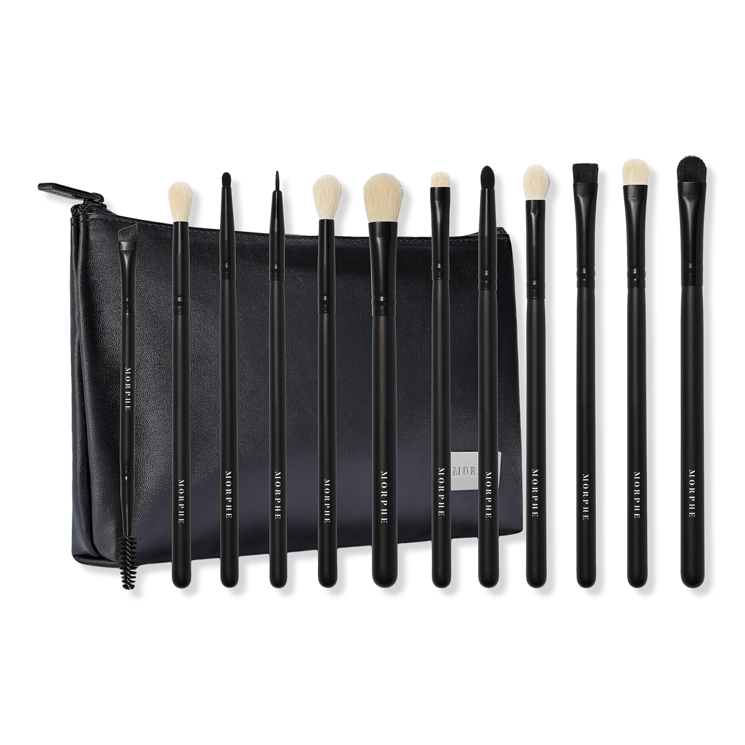 12 makeup brushes in front of a black carrying bag