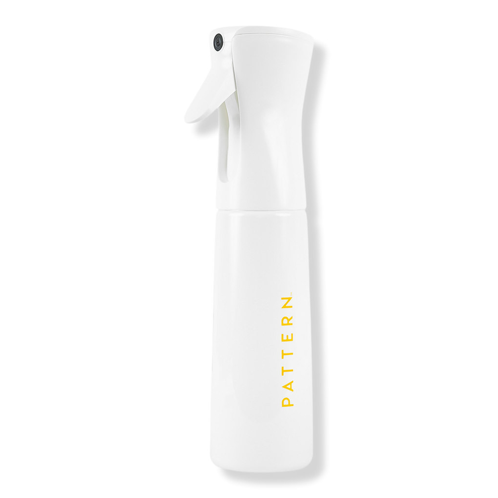 Premium Photo  White spray bottle and towel