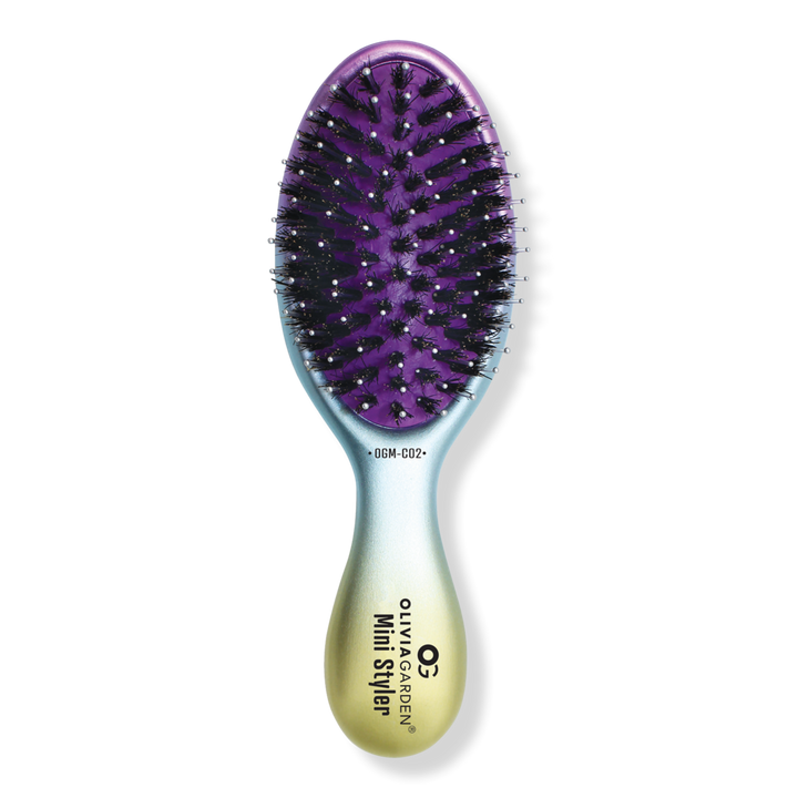 The Glow Beauty mini hair brush