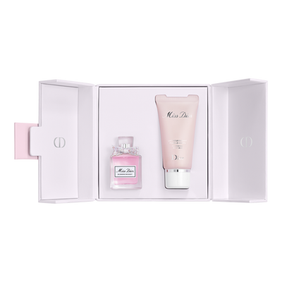 Dior Complimentary 2 Piece Gift with brand women's large spray fragrance purchase.